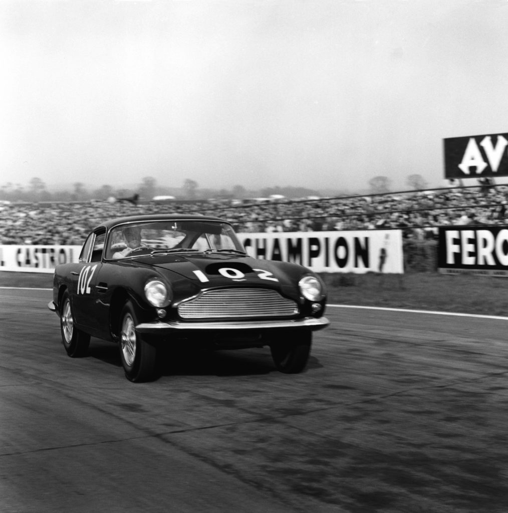 Goodwood, West Sussex, England. 18th April 1960. Stirling Moss (Aston Martin DB4 GT), 1st position, action. World Copyright: LAT Photographic. Ref: 6200.